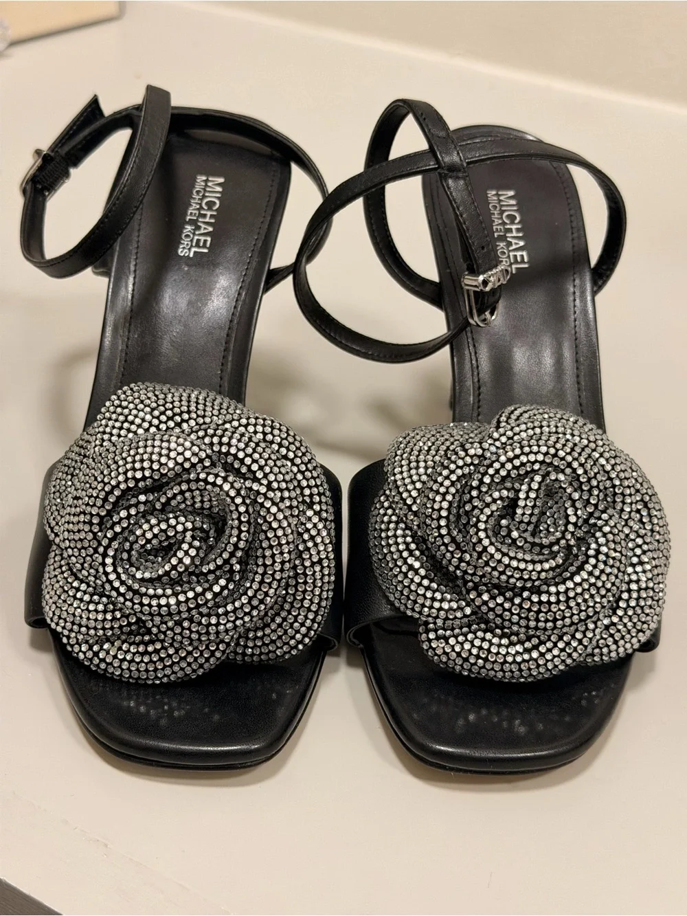 MICHAEL Michael Kors Black Heeled Sandals with Crystal Rosette